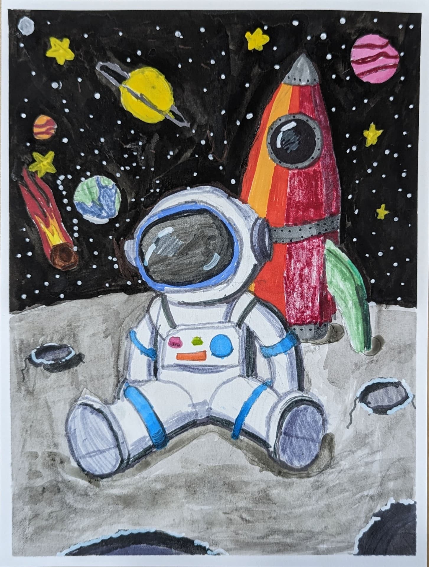 Mixed media astronaut on the moon by a young student